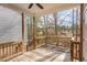 Wooden back porch overlooking a natural landscape at 2623 Broad Oaks Pl, Raleigh, NC 27603