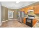 Eat-in kitchen with stainless steel refrigerator and a classic chandelier at 2623 Broad Oaks Pl, Raleigh, NC 27603