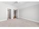 Bright bedroom featuring neutral walls, carpeted floors and two closets at 309 Taylor St, Raleigh, NC 27607