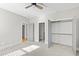 Bright bedroom with a walk-in closet, neutral carpet, and gray trim at 309 Taylor St, Raleigh, NC 27607