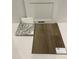 Interior design elements featuring flooring, cabinet, and granite countertop samples at 312 Chesapeak Commons St # 144, Garner, NC 27529