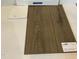 Interior design elements featuring flooring, cabinet, and granite countertop samples at 312 Chesapeak Commons St # 144, Garner, NC 27529