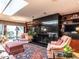 Living room with a unique dark marble fireplace at 3206 Sussex Rd, Raleigh, NC 27607