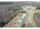 Expansive property featuring multiple structures, including a pond, sheds, and a main house at 3344 Cobb Farm Trl, Mebane, NC 27302