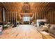 Unfinished attic space with exposed wooden beams, framing, and large window at 3344 Cobb Farm Trl, Mebane, NC 27302