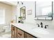 Modern bathroom with double sinks, granite countertops, and modern fixtures at 3344 Cobb Farm Trl, Mebane, NC 27302