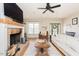 Cozy living room with fireplace, hardwood floors, and neutral decor at 3344 Cobb Farm Trl, Mebane, NC 27302