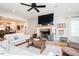Spacious living room with a fireplace, open layout, and hardwood floors at 3344 Cobb Farm Trl, Mebane, NC 27302