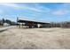 Large metal outbuilding or shelter suitable for storing equipment or vehicles with ample open space at 3344 Cobb Farm Trl, Mebane, NC 27302