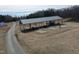 Aerial view of the shooting range and other amenities, enhancing the property's recreational appeal at 3344 Cobb Farm Trl, Mebane, NC 27302