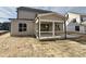 Covered back porch featuring a concrete floor and screen walls at 3521 Amelia Grace Dr # 67, Fuquay Varina, NC 27526