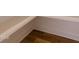 Close up of the wood floor, baseboard and trim molding details in this new construction house at 3521 Amelia Grace Dr # 67, Fuquay Varina, NC 27526
