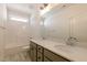 Bathroom with double sink vanity, modern lighting, and separate shower/tub at 3521 Amelia Grace Dr # 67, Fuquay Varina, NC 27526
