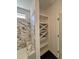 Bathroom with shelves and marble walled shower at 3521 Amelia Grace Dr # 67, Fuquay Varina, NC 27526