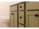 Close-up of bathroom cabinets with modern hardware and soft-close drawers, providing ample storage at 3521 Amelia Grace Dr # 67, Fuquay Varina, NC 27526