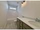 Bathroom featuring double sinks, a large white countertop, and a shower-tub combination at 3521 Amelia Grace Dr # 67, Fuquay Varina, NC 27526