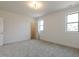 Expansive bedroom featuring plush carpet, ambient lighting and sun-filled view at 3521 Amelia Grace Dr # 67, Fuquay Varina, NC 27526