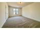 Bedroom featuring a window and plush carpet at 3521 Amelia Grace Dr # 67, Fuquay Varina, NC 27526