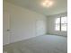 Neutral bedroom with carpet, closet and natural light at 3521 Amelia Grace Dr # 67, Fuquay Varina, NC 27526