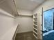 Spacious walk-in closet features multiple shelves and hanging rods at 3521 Amelia Grace Dr # 67, Fuquay Varina, NC 27526