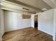 Dining room featuring hardwood floors, a chandelier, and trim work on the ceiling at 3521 Amelia Grace Dr # 67, Fuquay Varina, NC 27526