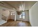 Dining room featuring hardwood floors, a chandelier, and large windows at 3521 Amelia Grace Dr # 67, Fuquay Varina, NC 27526
