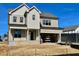 Two-story home with neutral siding, a two-car garage, and a covered entryway at 3521 Amelia Grace Dr # 67, Fuquay Varina, NC 27526