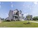 Beautiful two-story home featuring a covered front porch and attached two-car garage at 3521 Amelia Grace Dr # 67, Fuquay Varina, NC 27526