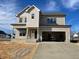 New construction home with a two-car garage, neutral toned siding, and a concrete driveway at 3521 Amelia Grace Dr # 67, Fuquay Varina, NC 27526