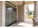 Elegant front entrance with stylish doors, decorative columns, and inviting curb appeal at 3521 Amelia Grace Dr # 67, Fuquay Varina, NC 27526