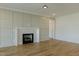Spacious living room featuring a fireplace and modern ceiling fan at 3521 Amelia Grace Dr # 67, Fuquay Varina, NC 27526