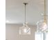 Beautiful pendant lights illuminate the kitchen island in this home at 3521 Amelia Grace Dr # 67, Fuquay Varina, NC 27526
