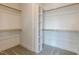 Spacious walk-in closet offers ample storage with built-in shelving and hanging rods at 3521 Amelia Grace Dr # 67, Fuquay Varina, NC 27526