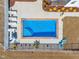 Birds eye view of an in-ground pool and brick pool deck, surrounded by lounge chairs at 3608 Buzzard Rd, Wendell, NC 27591