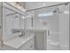 White and bright bathroom with a glass shower and stylish tiling at 3608 Buzzard Rd, Wendell, NC 27591