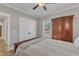 Bedroom featuring hardwood floors, natural light, and wood furniture at 3608 Buzzard Rd, Wendell, NC 27591