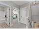 Upstairs hallway with a view into the bathroom, bedroom, and staircase at 3608 Buzzard Rd, Wendell, NC 27591