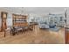 Open-concept living space with a dining table and a sitting area with a blue patterned rug at 3608 Buzzard Rd, Wendell, NC 27591