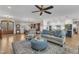 Open living space with a sitting area, dining table, and a view of the kitchen at 3608 Buzzard Rd, Wendell, NC 27591