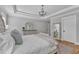 Spacious main bedroom featuring a stylish bed, dresser, and elegant lighting fixture at 3608 Buzzard Rd, Wendell, NC 27591