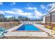 Backyard showcasing an in-ground swimming pool, and a lovely patio area with lounge chairs at 3608 Buzzard Rd, Wendell, NC 27591