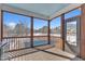 Screened-in porch featuring a light blue ceiling and a view of the pool and yard at 3608 Buzzard Rd, Wendell, NC 27591