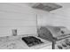 Summer kitchen featuring a built-in grill, stainless steel appliances and granite countertops at 3608 Buzzard Rd, Wendell, NC 27591