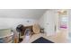 Unfinished attic area perfect for storage, offering potential for customization and expansion at 365 Shawnee Dr, Louisburg, NC 27549
