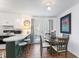 Eat-in kitchen and dining room with backyard access and natural light at 365 Shawnee Dr, Louisburg, NC 27549