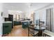 Eat-in kitchen features bar seating, custom cabinets and an adjacent dining area at 365 Shawnee Dr, Louisburg, NC 27549