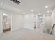 A bright and airy loft with neutral walls and plush carpeting at 3725 Rosebush Dr, Zebulon, NC 27597