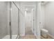 Bathroom featuring glass shower and toilet at 3727 Rosebush Dr, Zebulon, NC 27597