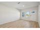 Bright, spacious living room with hardwood floors and natural light at 3727 Rosebush Dr, Zebulon, NC 27597