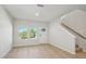 Bright, spacious living room with hardwood floors and natural light at 3727 Rosebush Dr, Zebulon, NC 27597